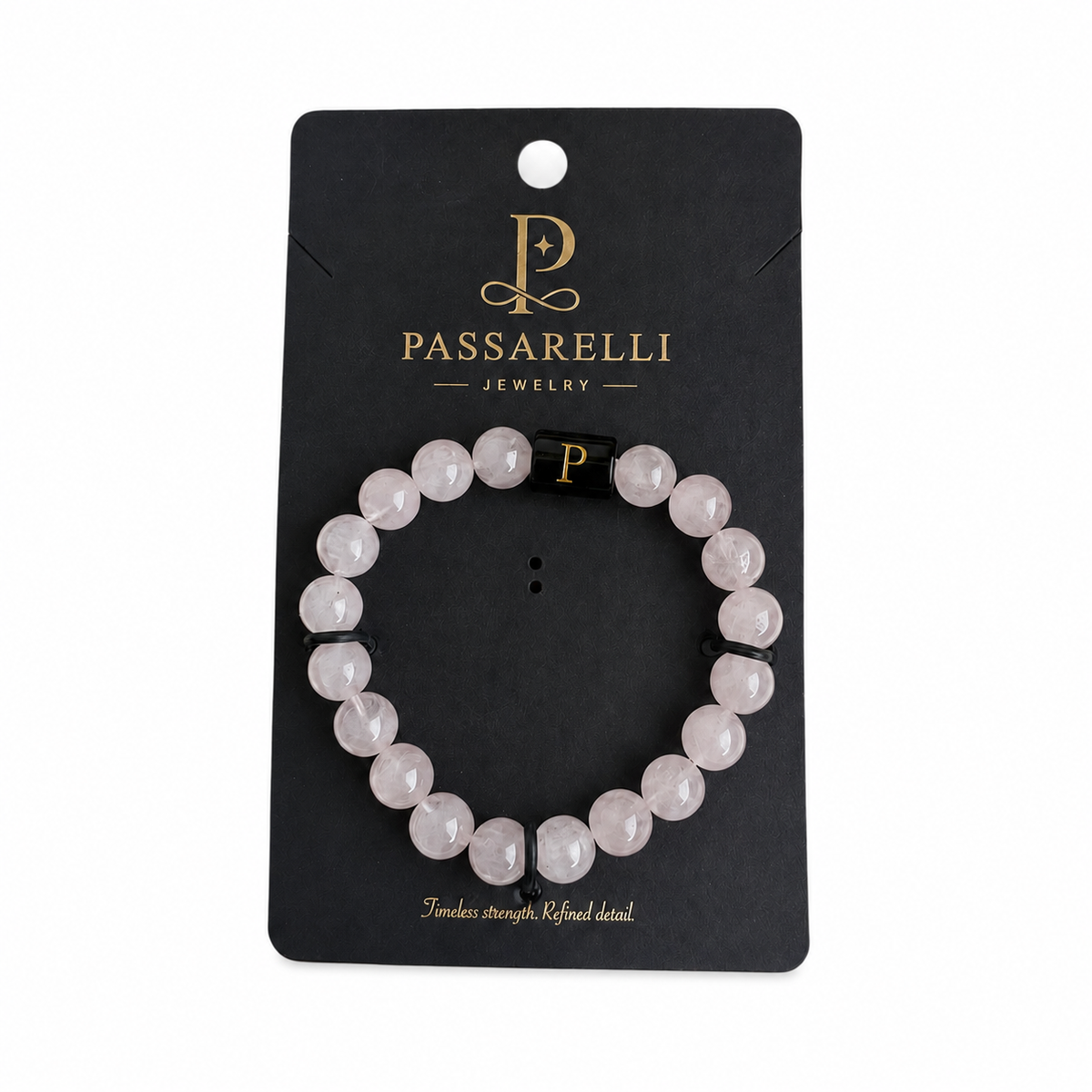 Passarelli rose quartz beaded stretch bracelet with black onyx accent beads and branded black P charm
