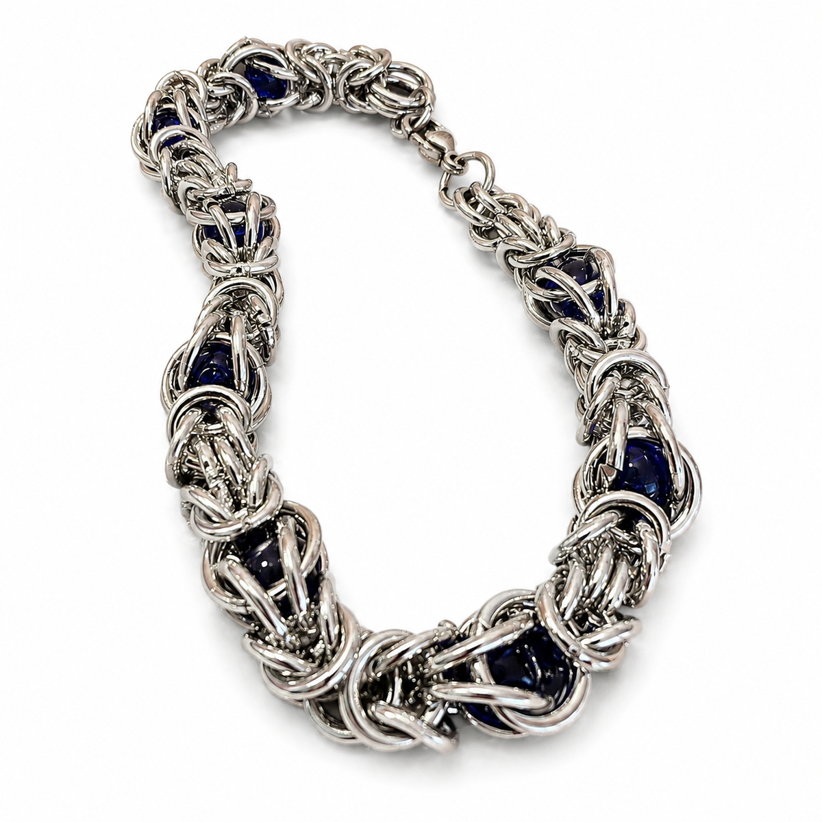 Silver Byzantine chain bracelet with blue gemstone accents - view 1