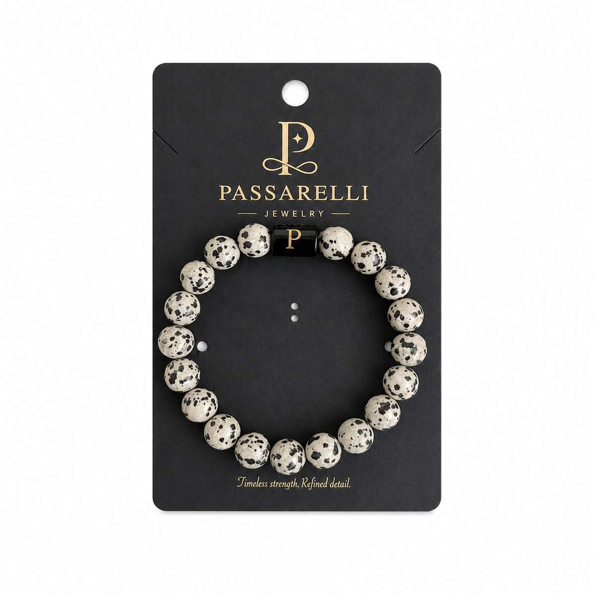 Passarelli dalmatian jasper 10mm beaded stretch bracelet with black and cream spotted stone beads, black onyx accents, and branded black P charm